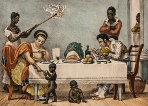 Família brasileira do século XIX sendo servida por escravos